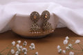 Amber Glow Antique Kundan Jhumka Earrings