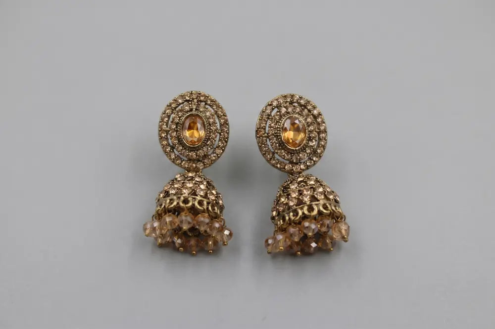 Amber Glow Antique Kundan Jhumka Earrings